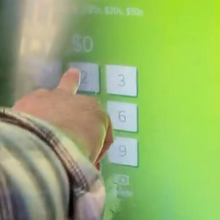 Sidewalk ATM swipe